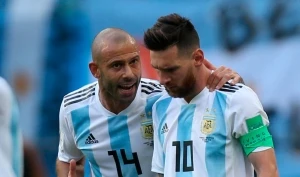 Macherano y Messi