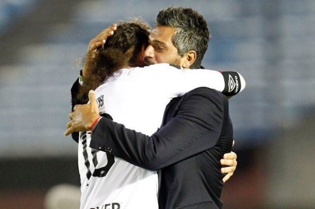Gustavo Munúa y Hernán Barcos